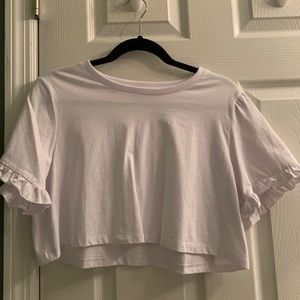 White ruffle sleeved top